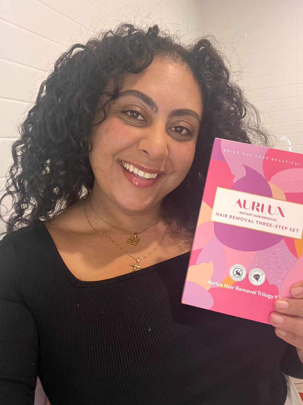 Customer holding the hair removal kit