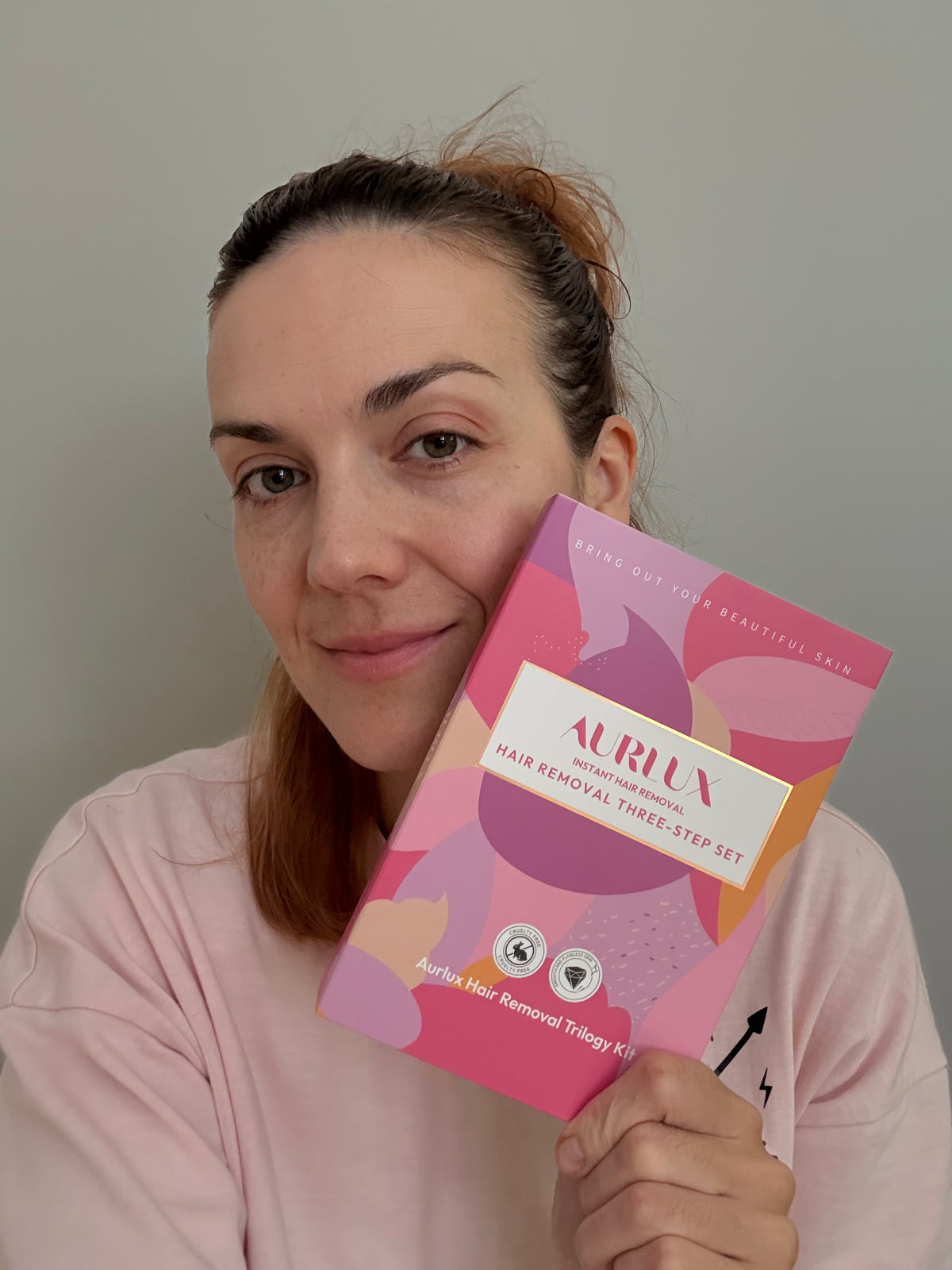 Customer holding the hair removal kit