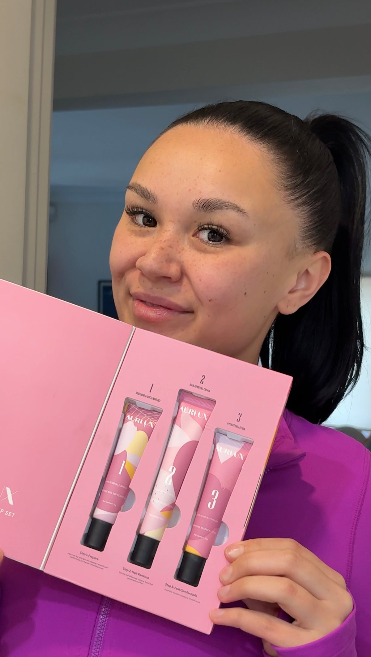 Customer holding the hair removal kit